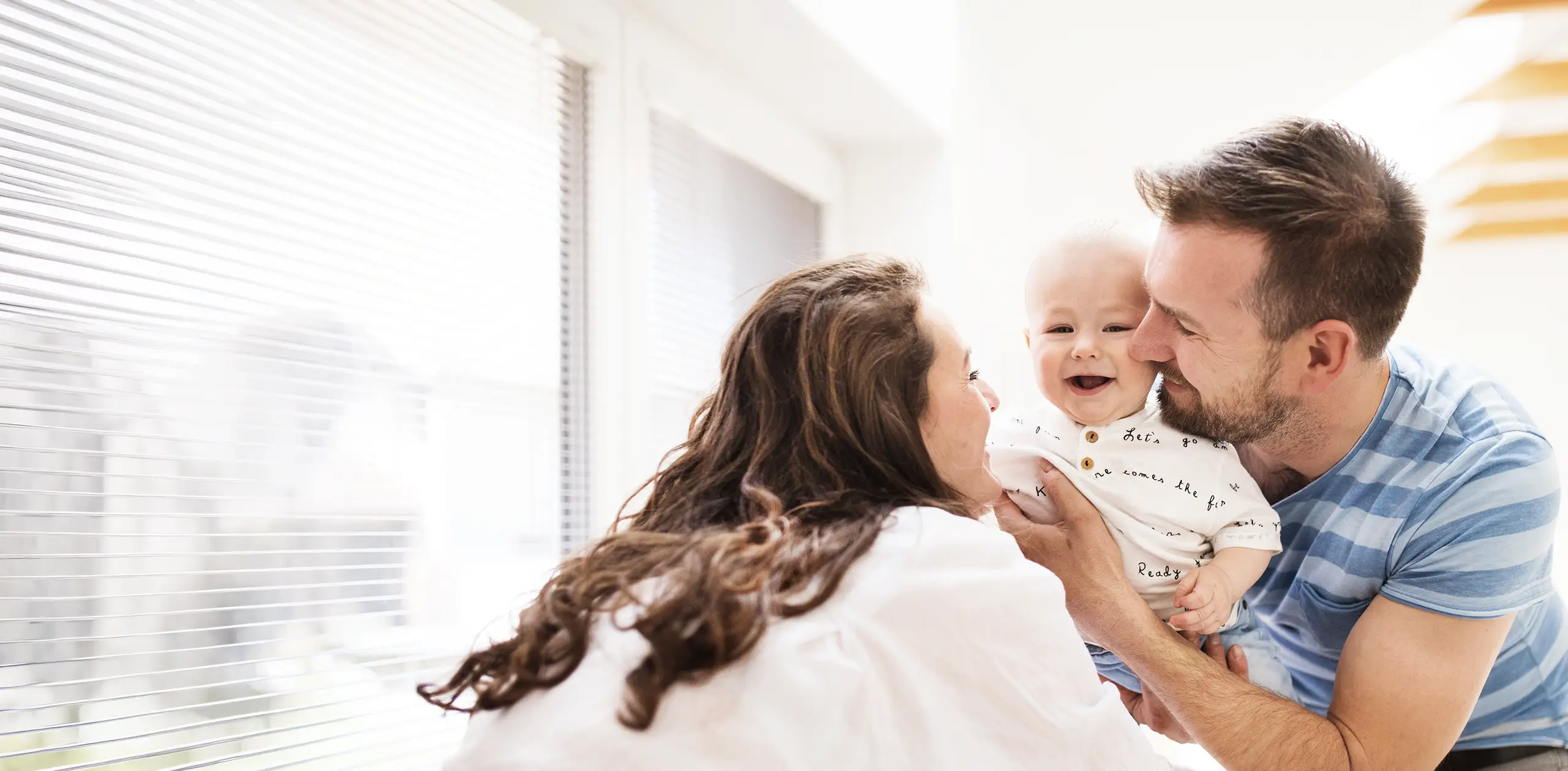 Young family with a baby boy at home
