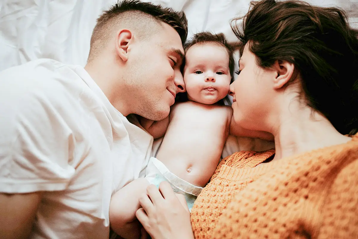 happy parents with their baby